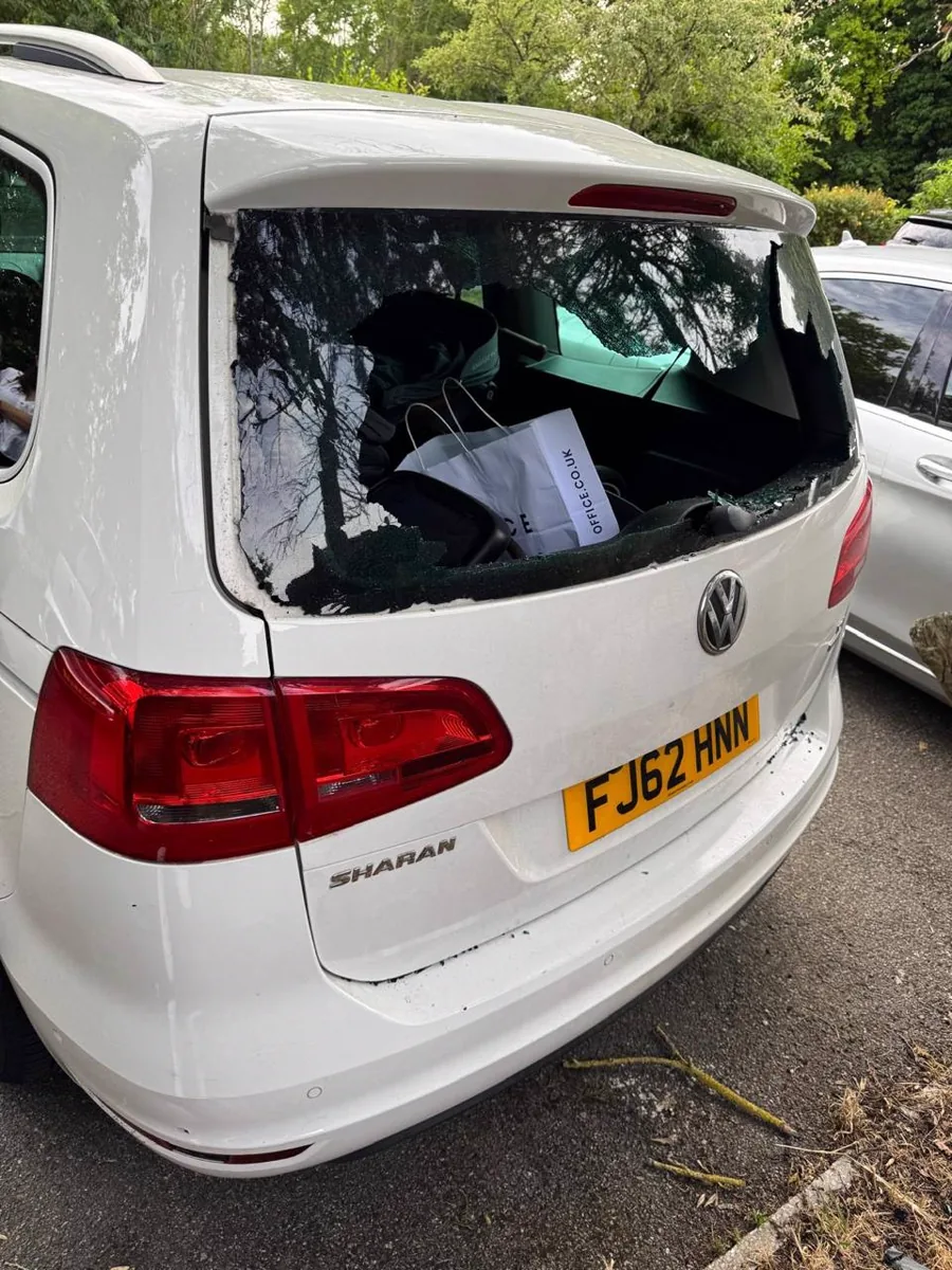 Replacement rear glass on a white Volkswagen van
